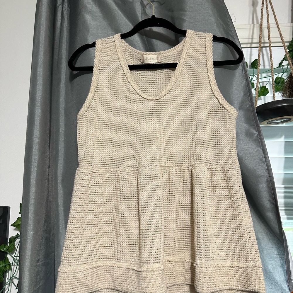 Cream Sleeveless Knit Top